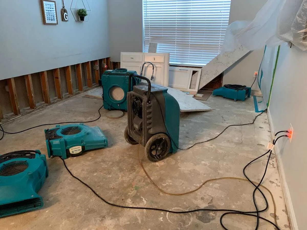 Dehumidifier in flood-cut room for Water Damage Restoration in Neptune